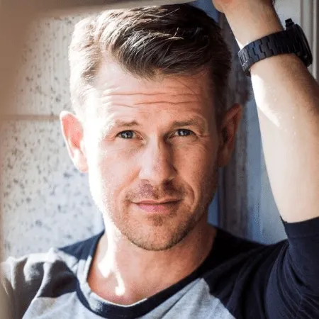 Man with styled hair, coach portrait
